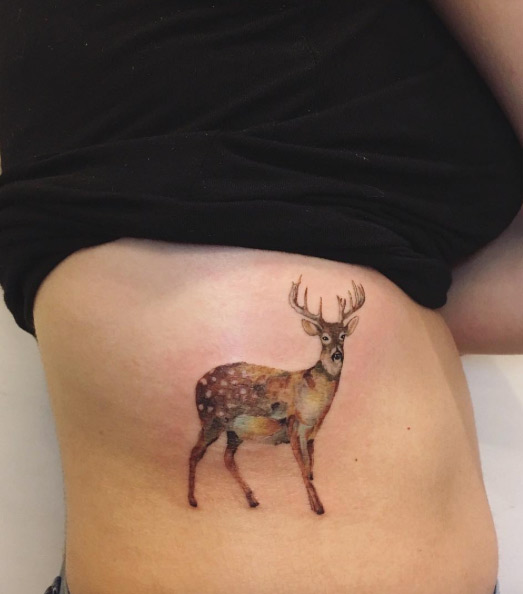 painted-deer-rib-cage-tattoo
