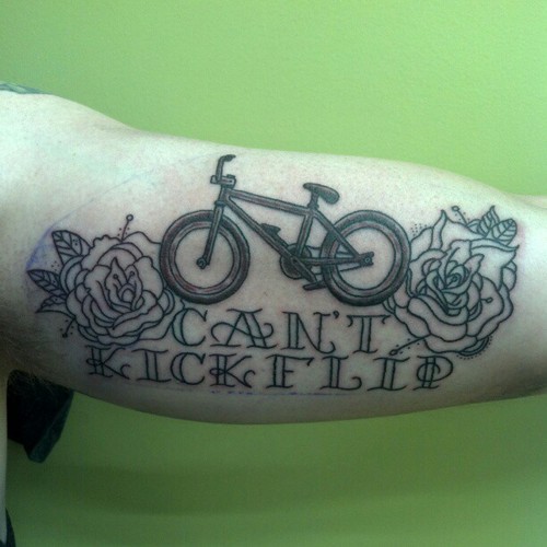 Cant-Kick-Flip-Bmx-Bike-With-Two-Rose-Tattoo-On-Bicep